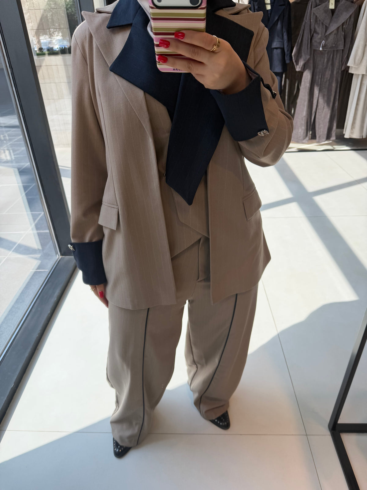 Classic beige suit navy touch